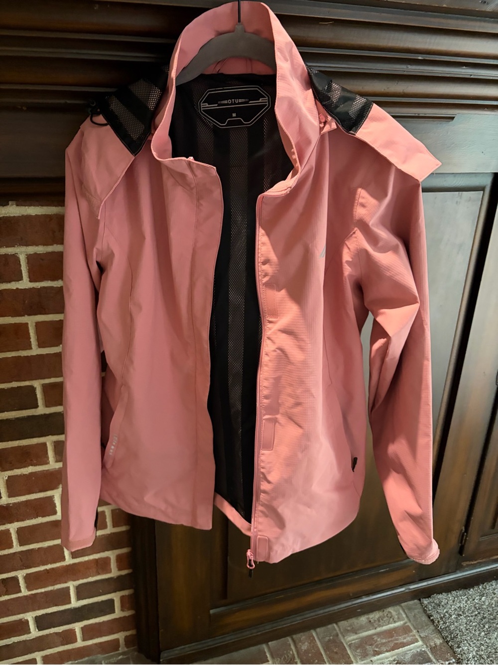 OTU pink rain coat size medium